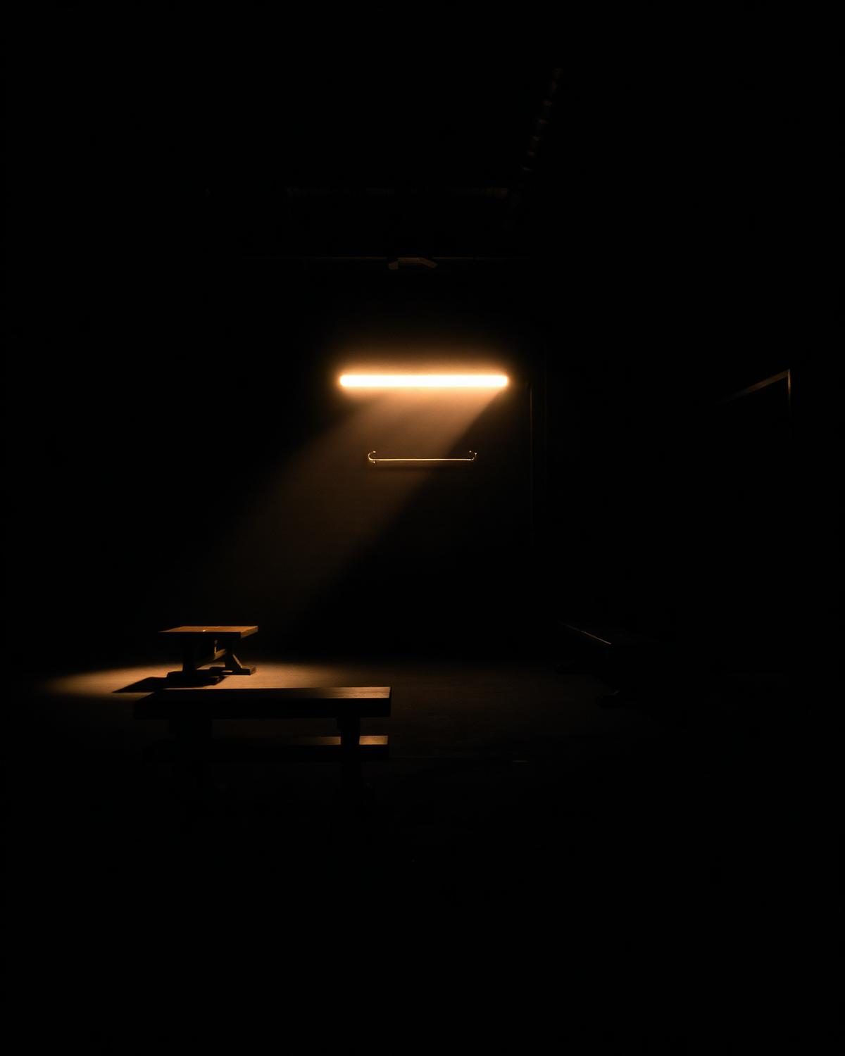 Quiet Space Gym floor lit by a single overhead light